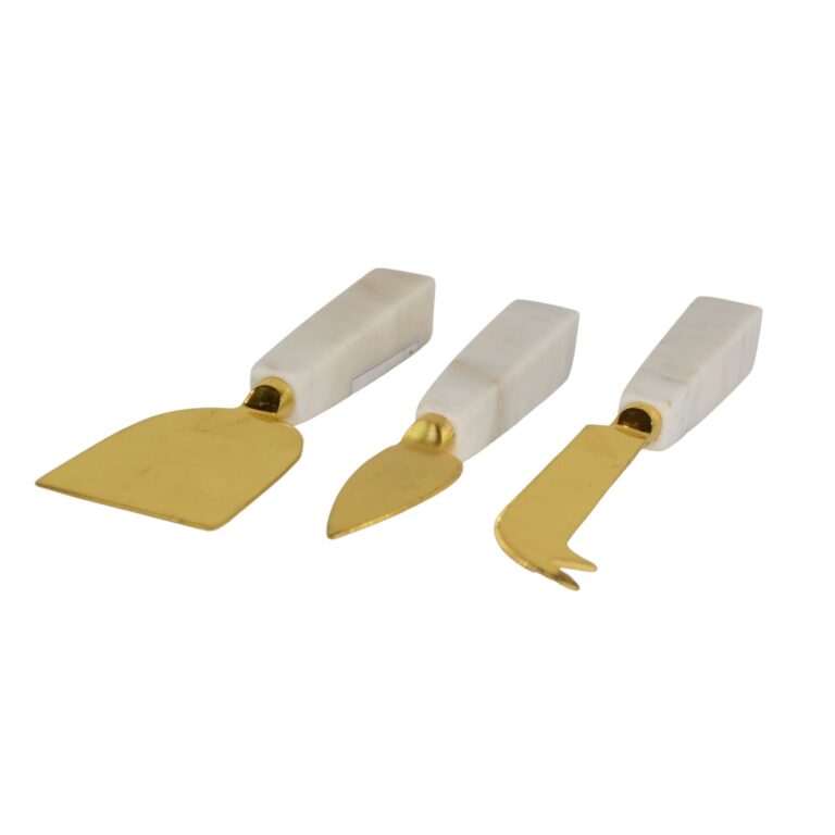 white marble and brass cutlery