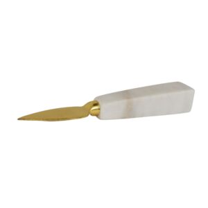 white marble and brass cutlery