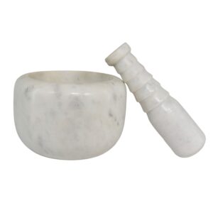 white marble mortar and pestles